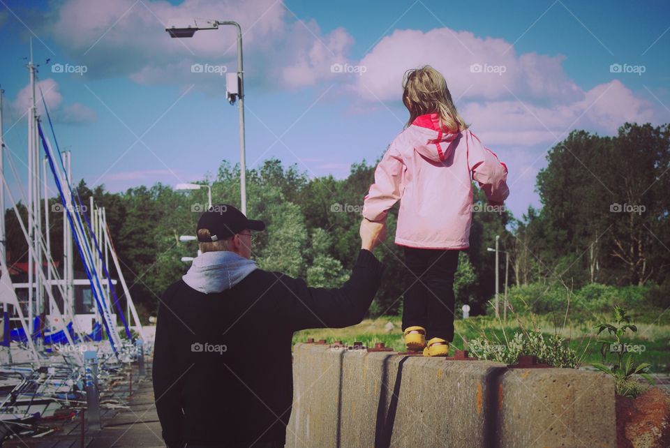 Sometimes you need a helping hand. Father and daughter