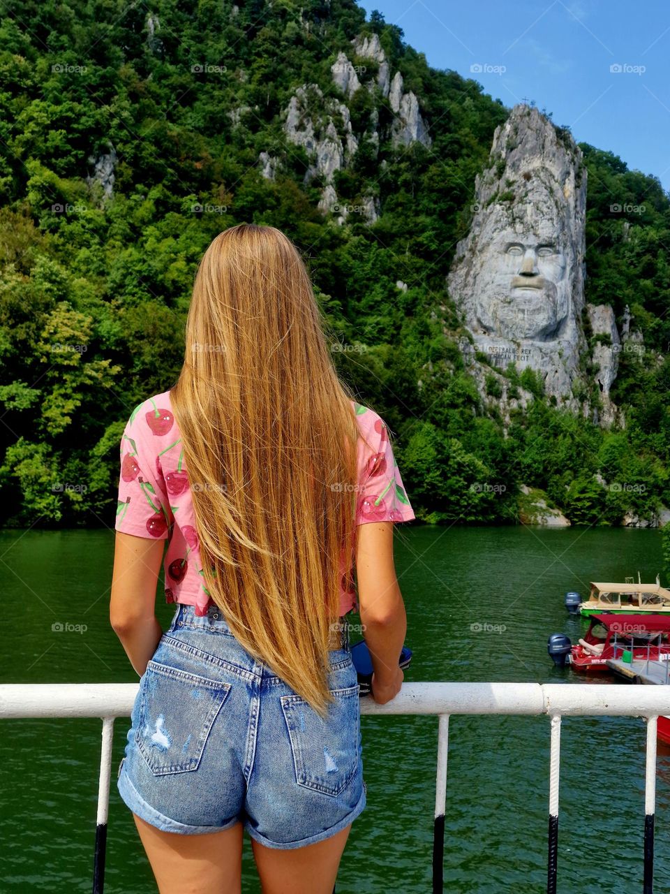 the young girl with the magenta t-shirt with cherries