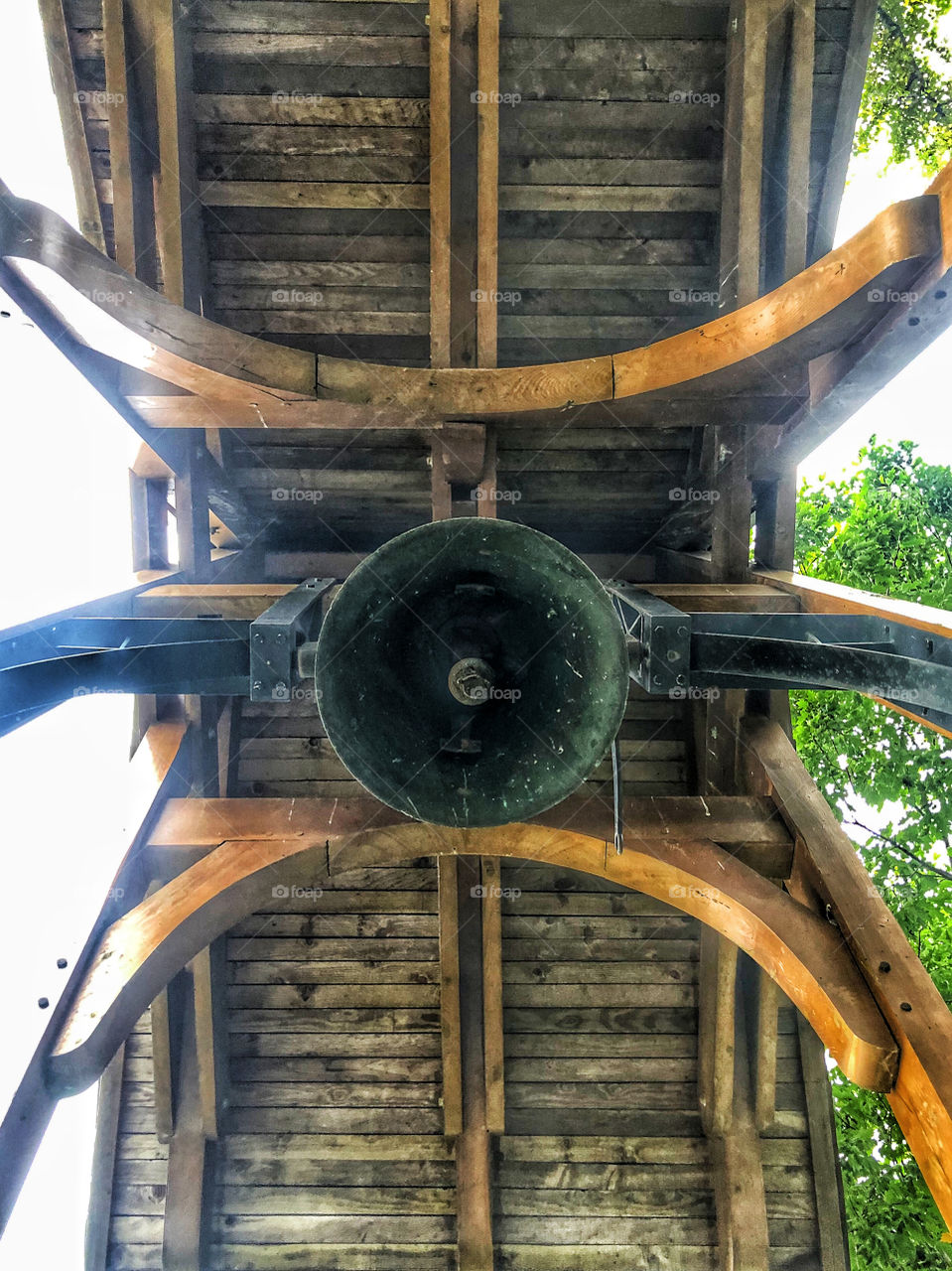 View of old wooden bell tower from below 