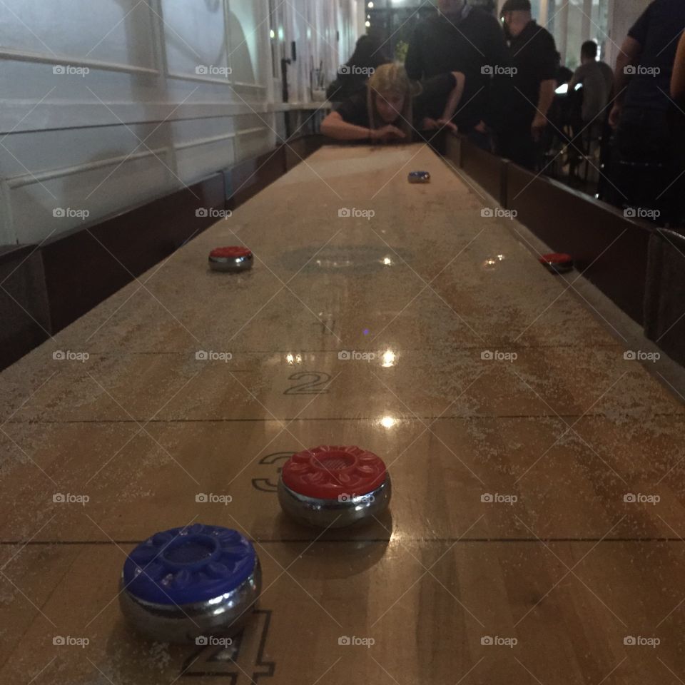 Shuffleboard anyone?. At preux and proper in Downtown la for happy hour and bar games...