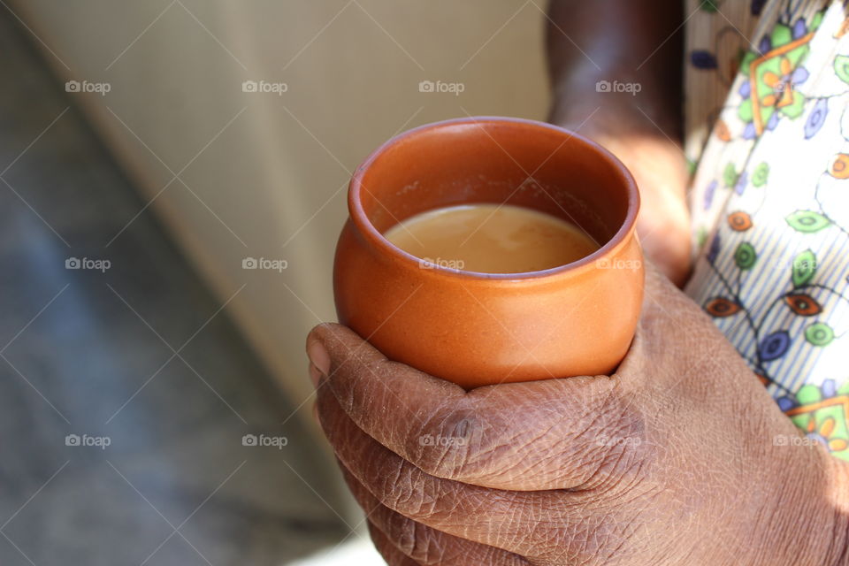 Women holding cup of coffee