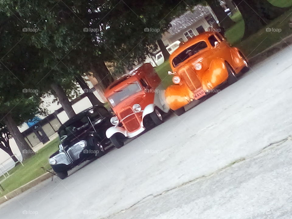 early to the car show, they're just starting to come in. it's going to be a fun day!