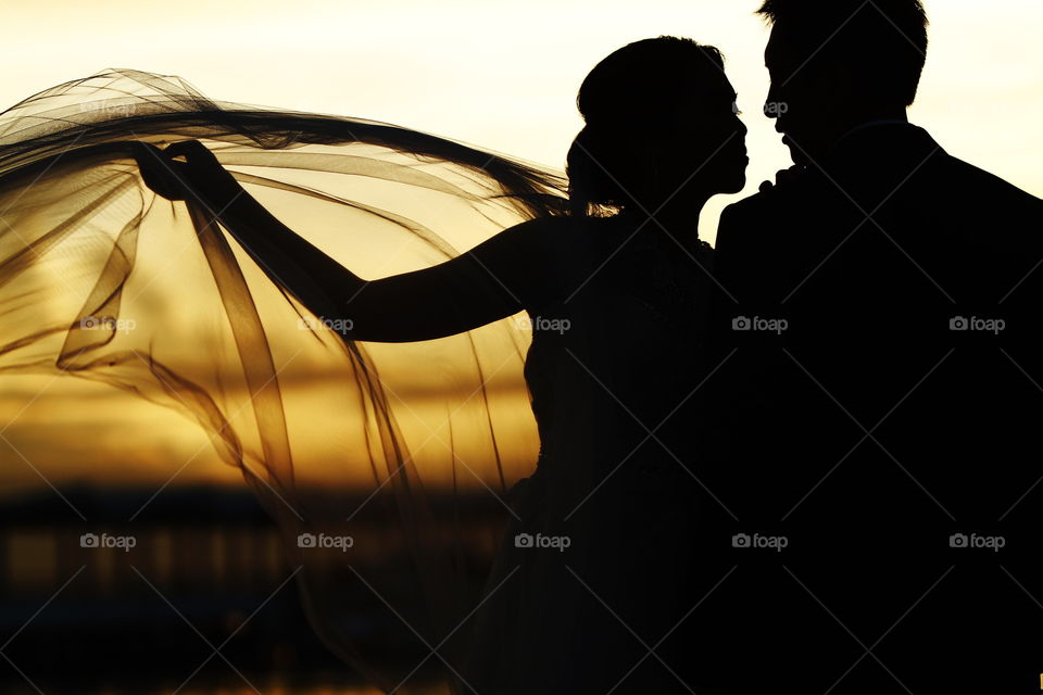 a silhouette of a couple
