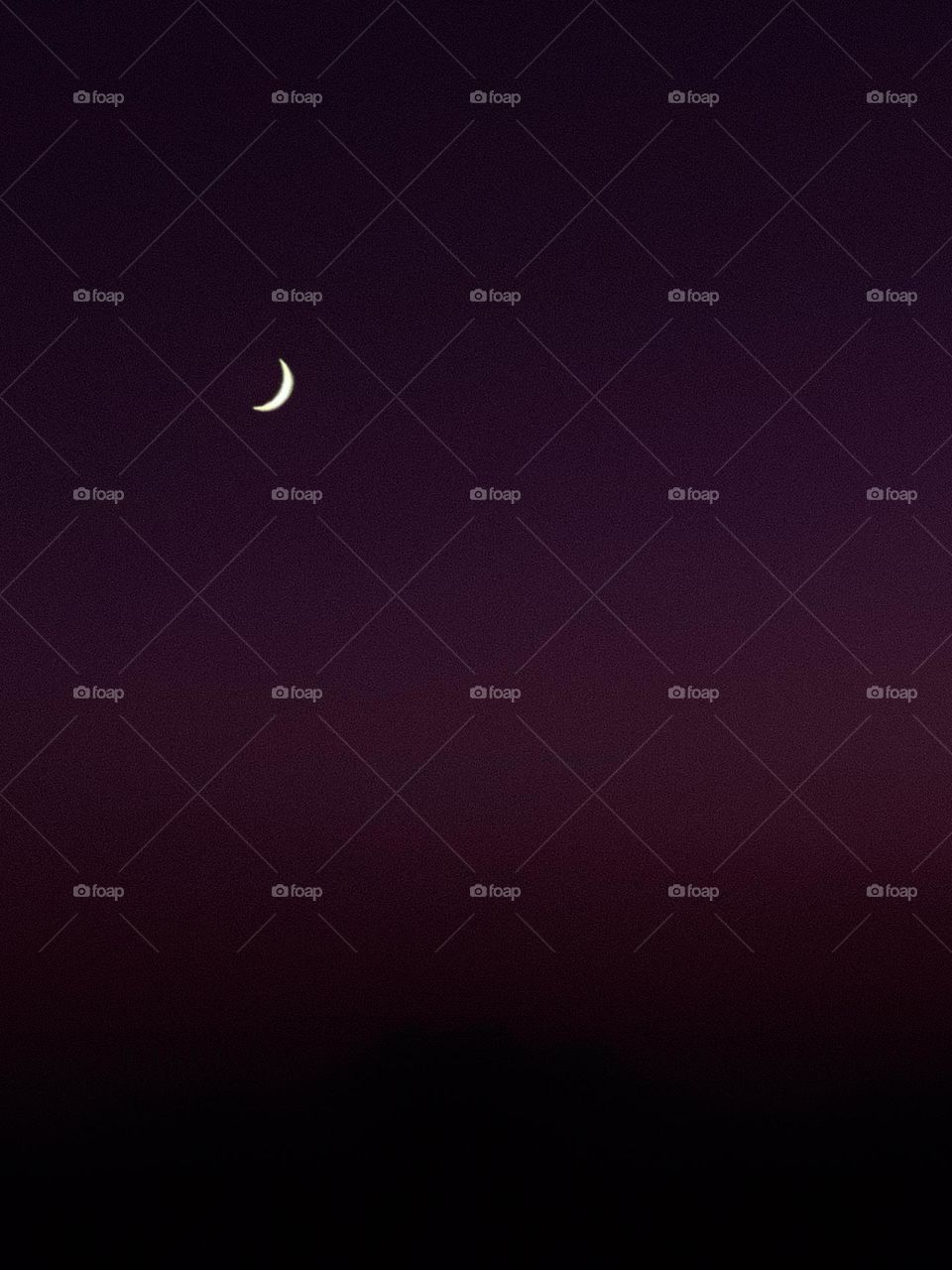 The color of the sky in contrast of the moon made for a shot I just had to get.