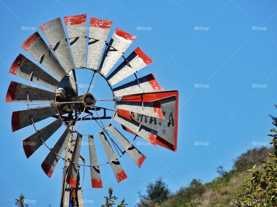 Antique Windmill. Old Fashioned Windmill On An American Farm
