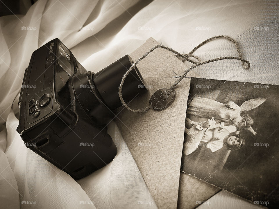 Camera. The envelope. Old photo