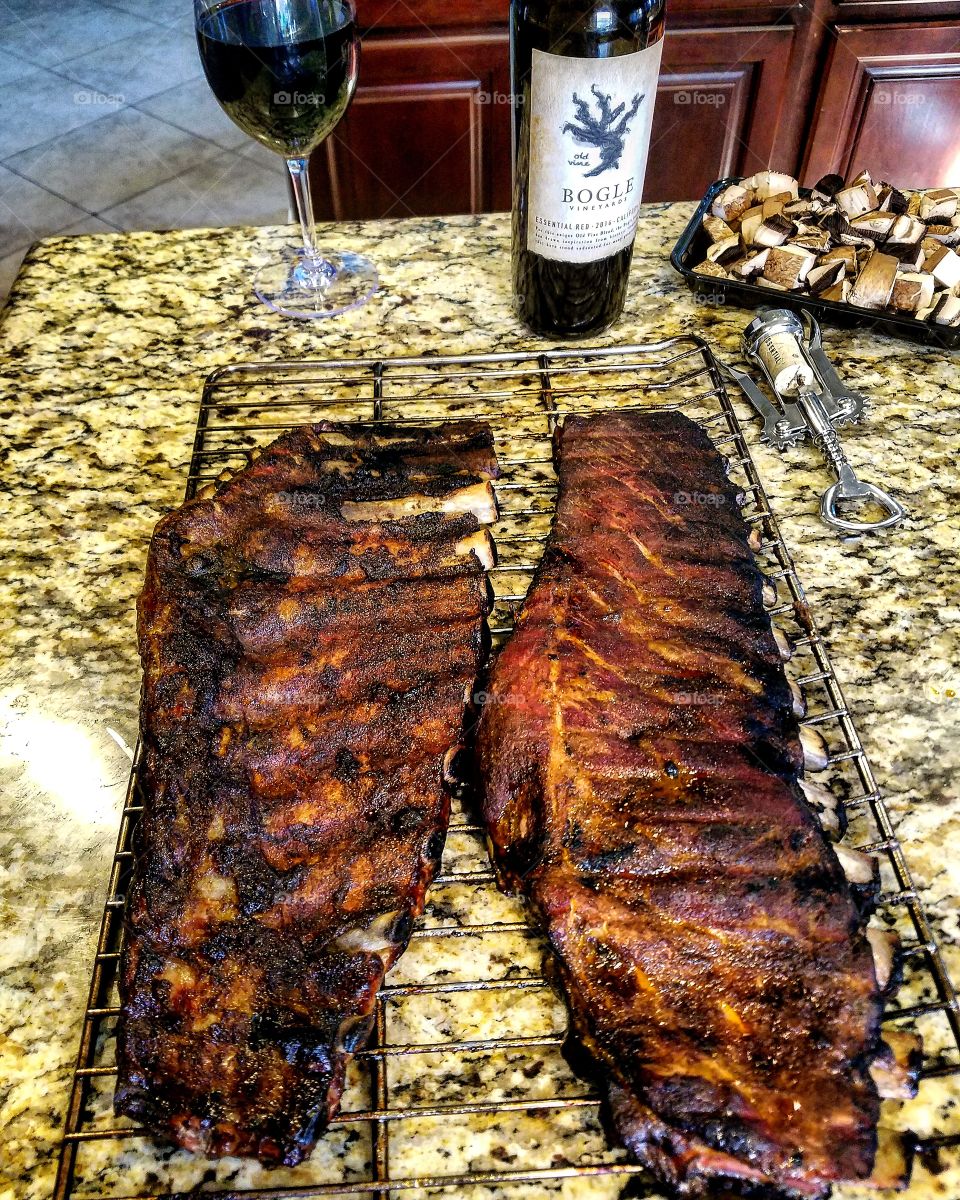 Today's project was 2 rack or spare ribs smoked over cherry wood, rubbed with a spicy warm rub, on a perfectly beautiful Texas day.