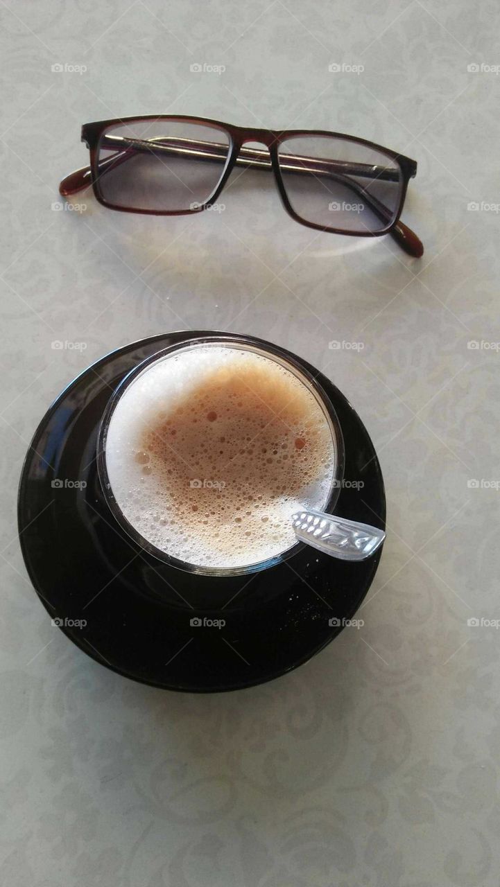 My favorite coffee and my glasses.