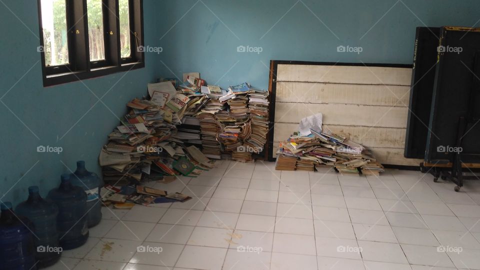 A pile of school books that are no longer in use