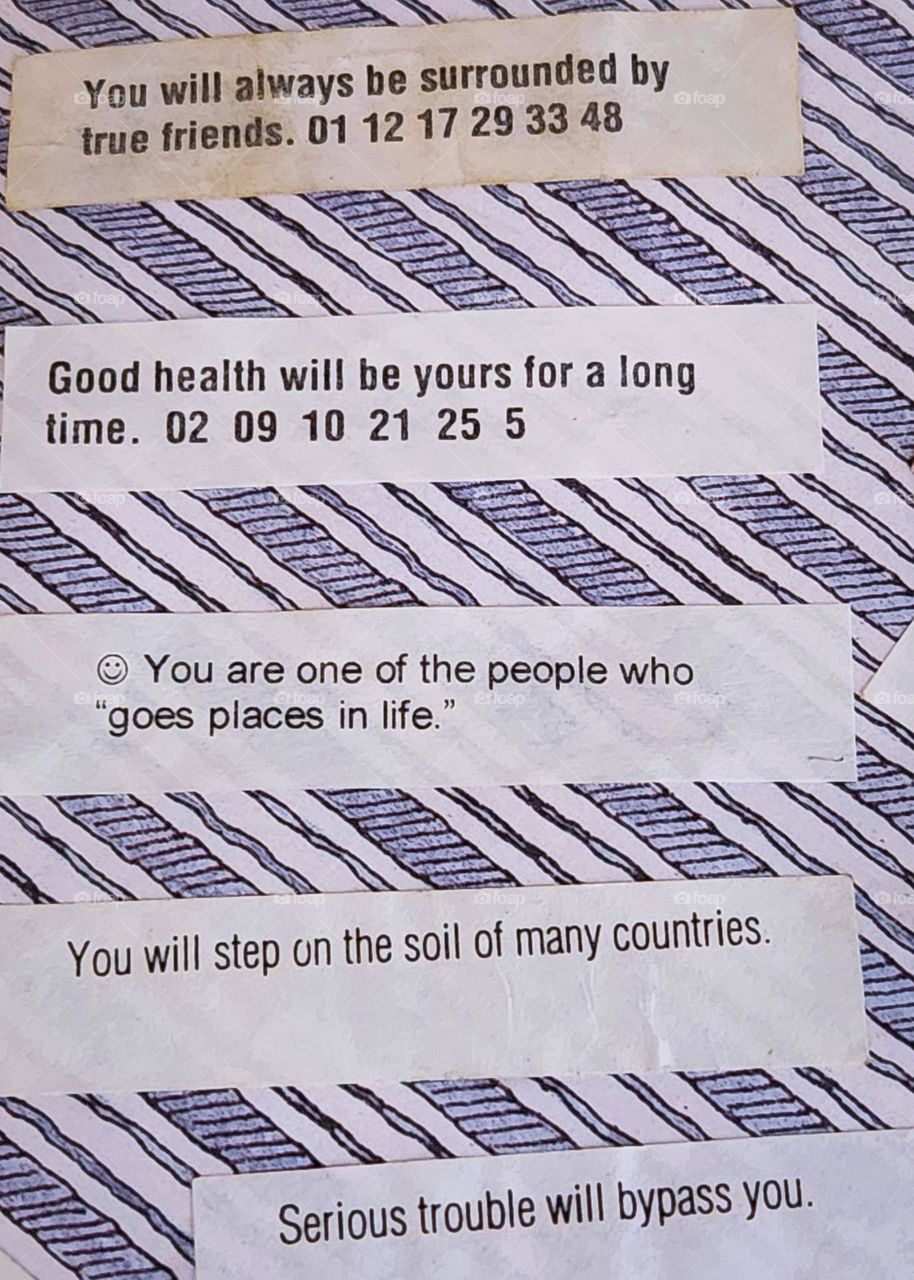 a collection of positive affirmations and lucky numbers from fortune cookie papers