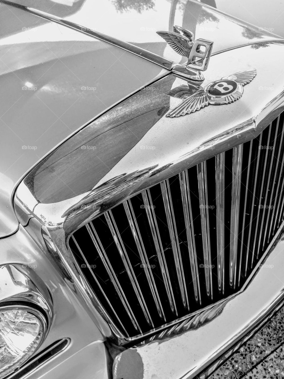 Classic luxury car the Bentley with its winged "B" badge proudly displayed on the bonnet.