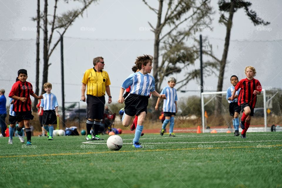 Kids Playing Team Soccer