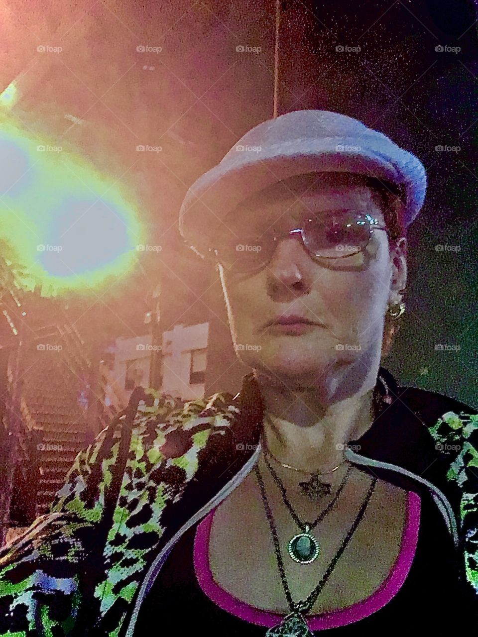 A self portrait in the glaring lights of the lanterns underneath the Pulaski Bridge in Long Island City. Queens, New York. Photo October 2020. Hypnotic Productions