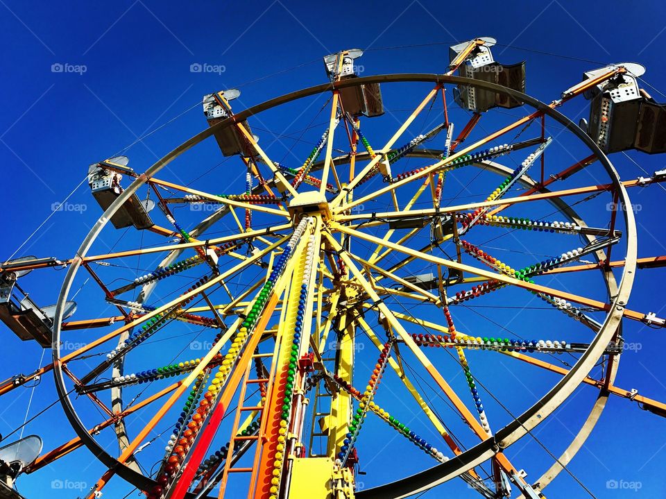 Colorful ferries wheel ride at the Allen county fair in Ohio August 2017