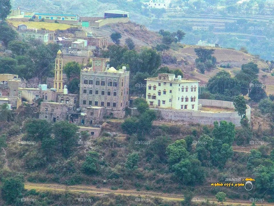 A stunning view of green mountains covered in fog in Yemen