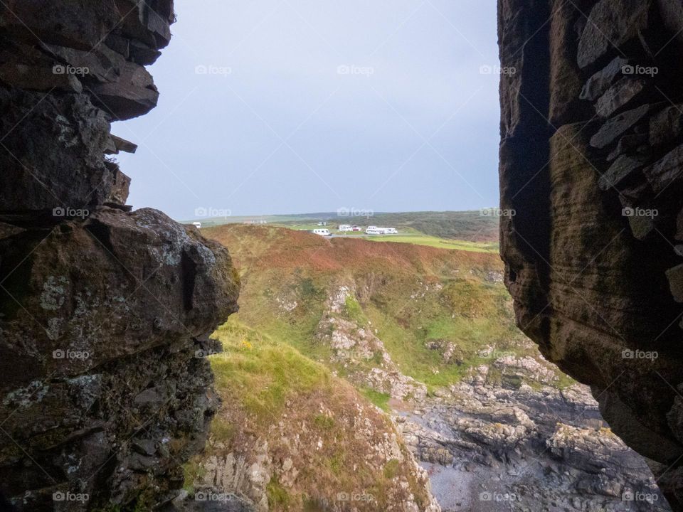 Campervans on a cliff