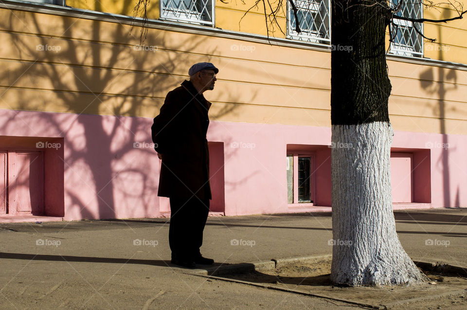 Silhouette of elderly man
