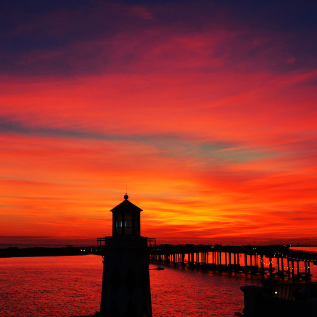 Amazing Silhouettes! Like the meeting of two worlds - the known and the unknown. The sun is like a great big romantic, inspirational fire in the sky. Brilliant streaks of yellow, orange, gold, blue, pink and red overcome the blue and purple of the sky. The sky resembled a prism; all the colors blended perfectly together. It's as if the colors and intensity of the light is just right! My work is done for today. I'm not sure what tomorrow will bring, but I'll be prepared for it!