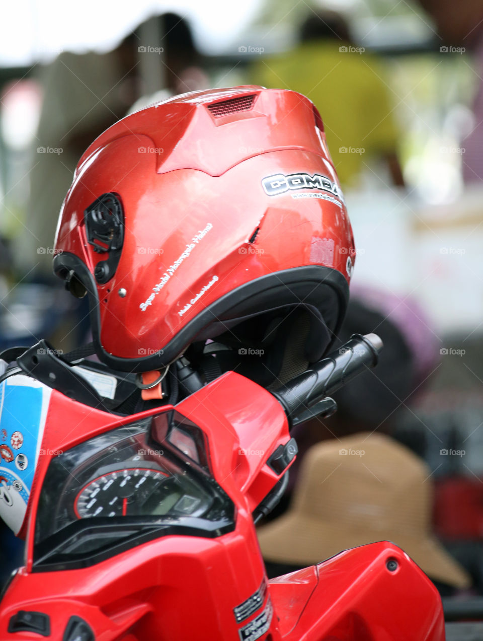 Red Helmet on Bike. travelling through Bangkok and this caught my eye