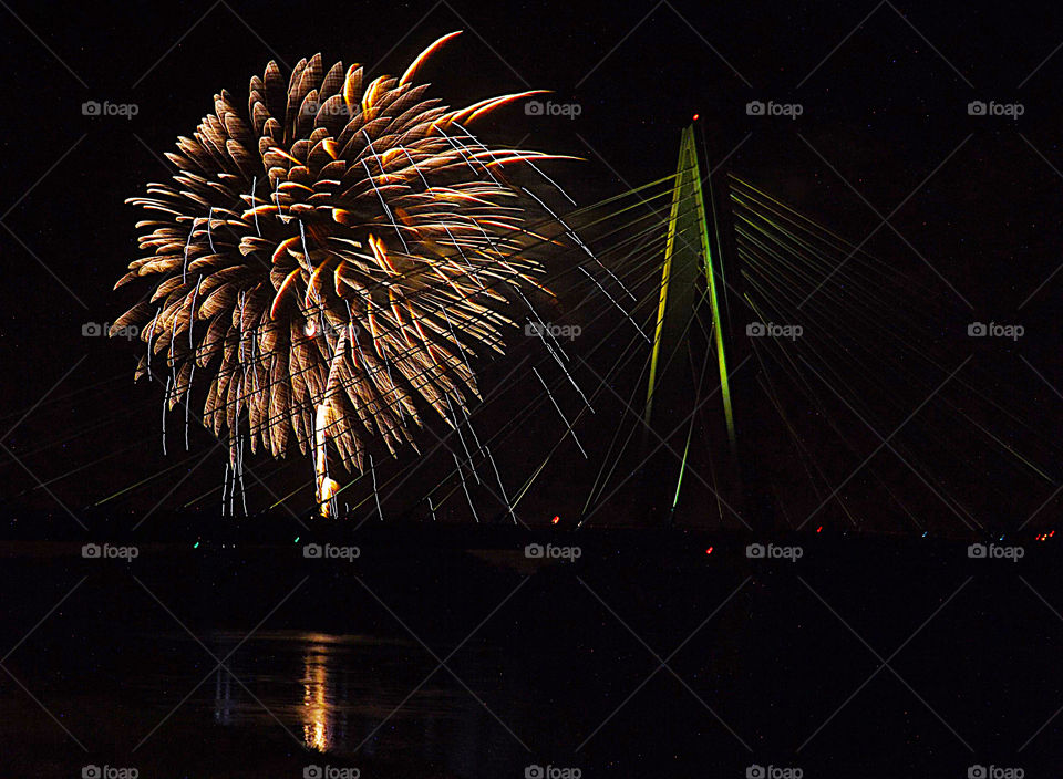 Fourth of July Fireworks Over Bridge. I took this photo on the Fourth of July at the Christopher S. Bond bridge in Kansas City.