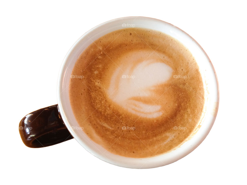 Latte . While having coffee with a friend a took this photo because I liked the design in the latte.