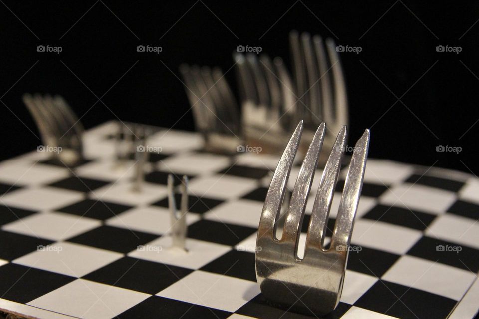 Fork Chess game board view from opposite side of board King Queen Bishop Tower Pawns