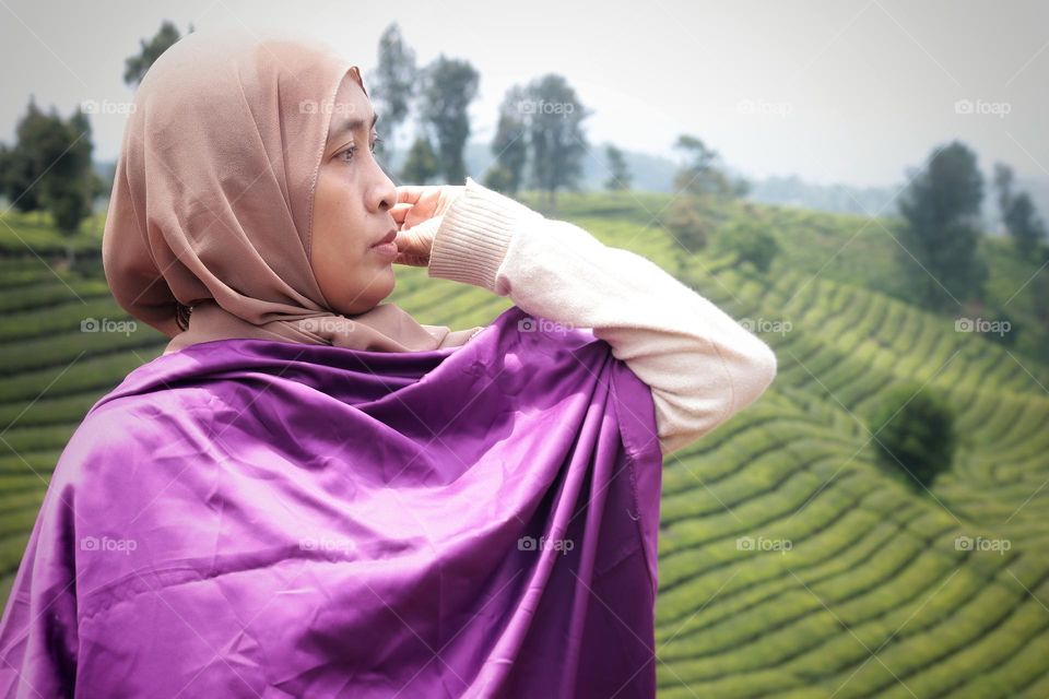 woman standing in field