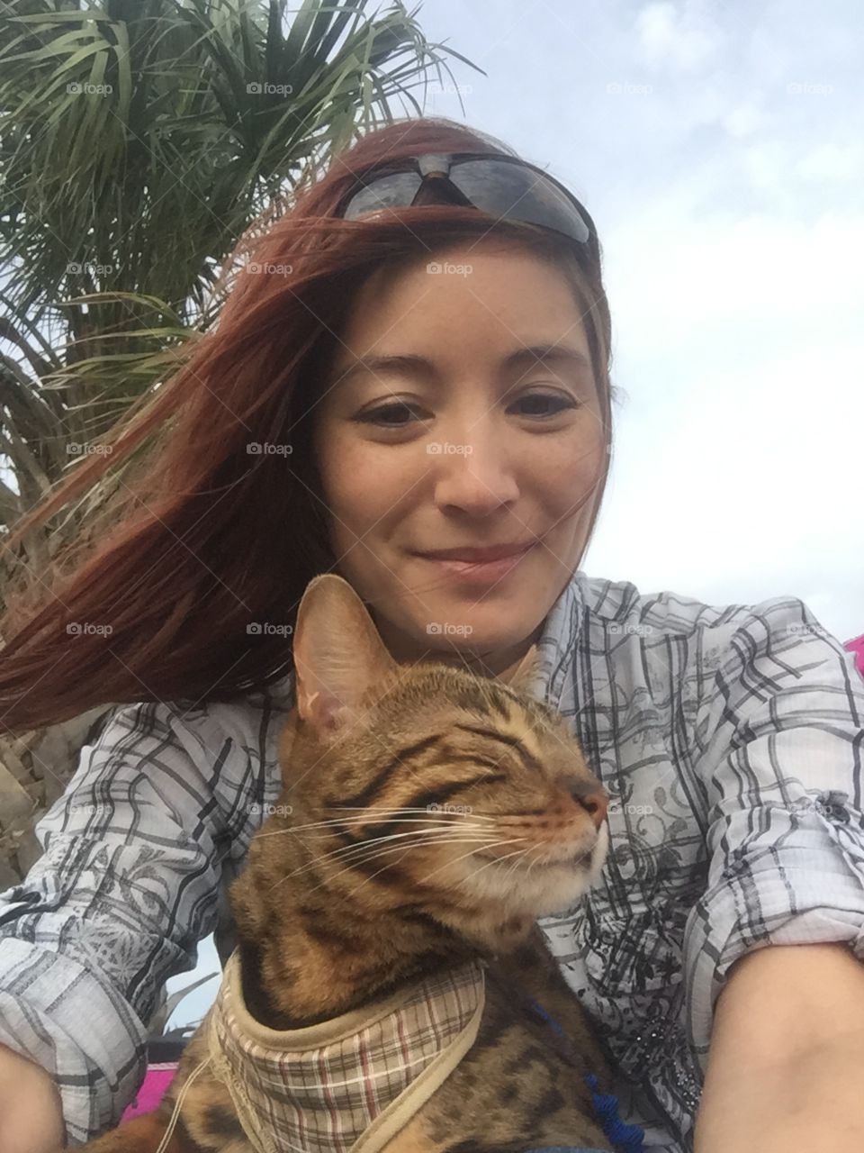 Enjoying a breezy day with my Bengal cat, Rajah. 