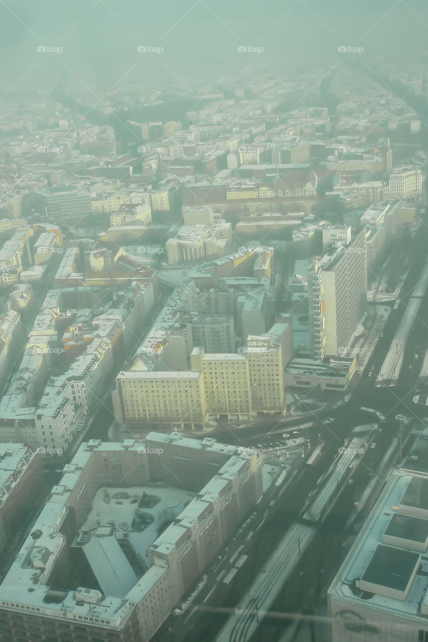 Foggy weather in Berlin city. A view on the city from a high point.