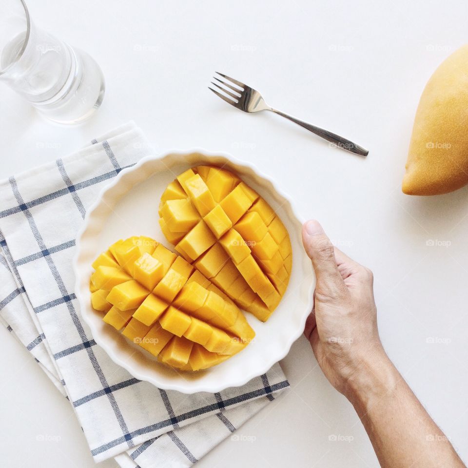 Slice of mango on plate