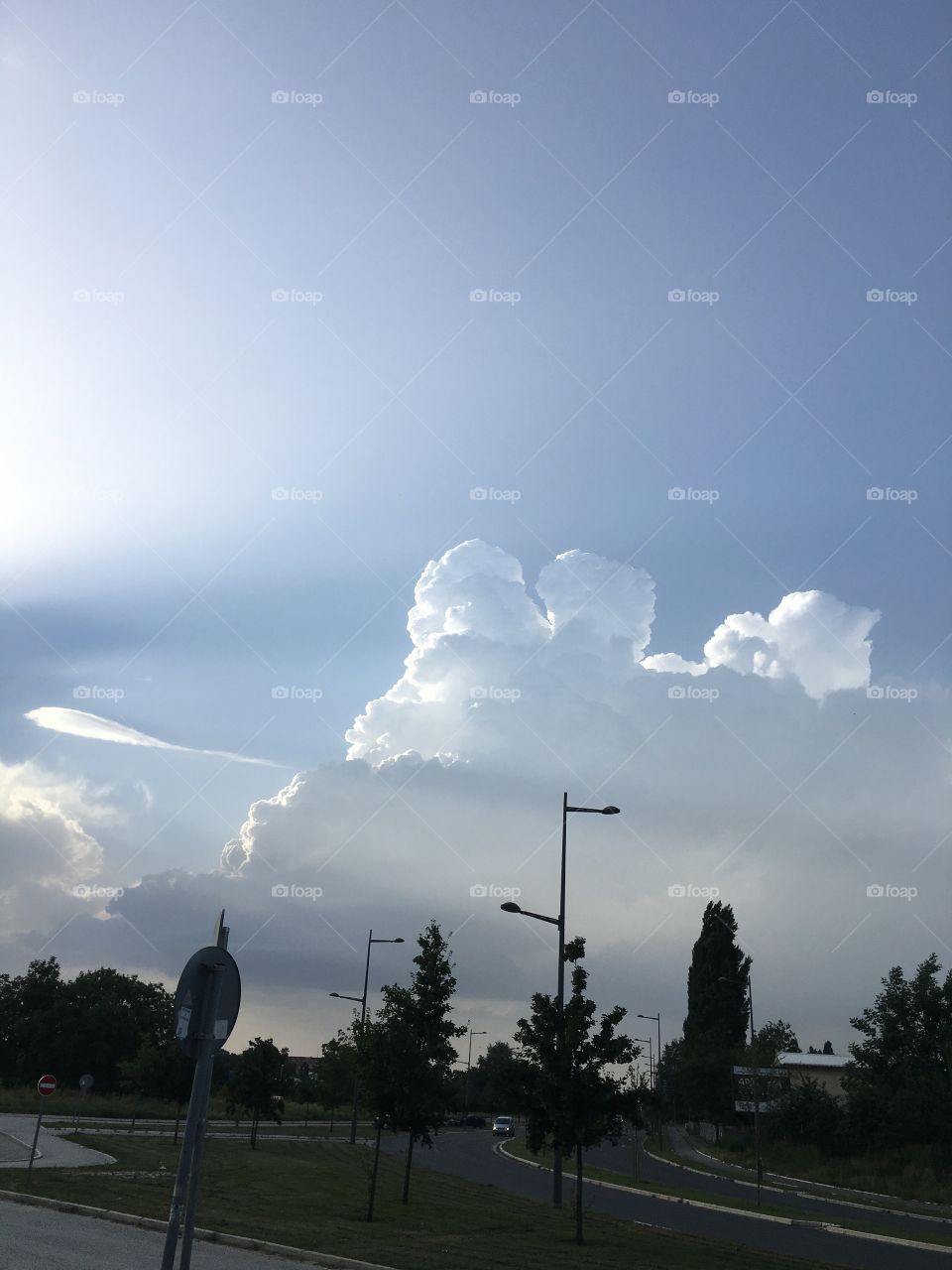 The sun is playing with the clouds