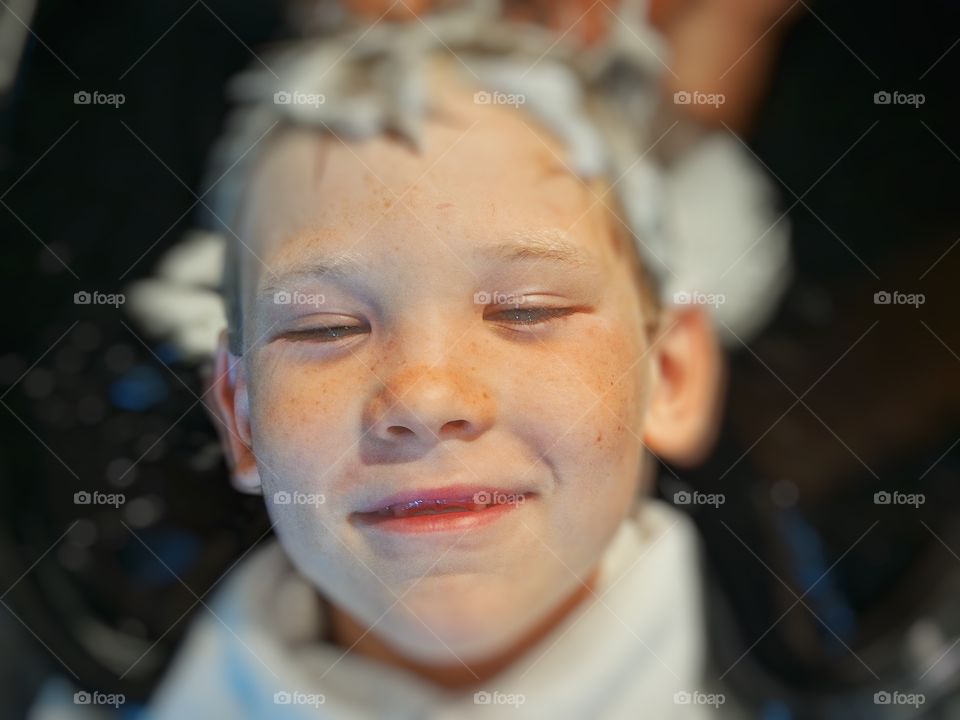 Shampoo In Hair. Young Boy Enjoying Shampoo Before A Haircut
