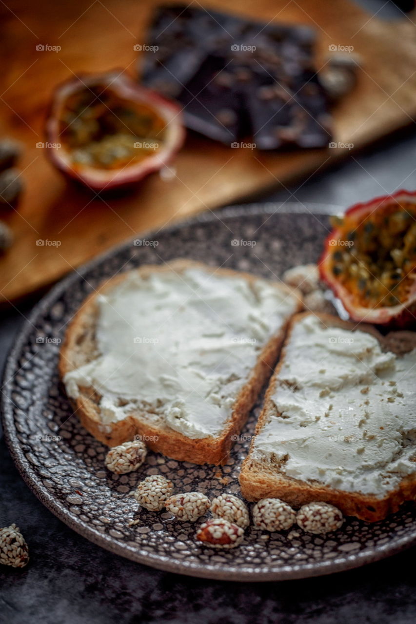 Dietary sandwiches of grain toasts with cream cheese and avocado