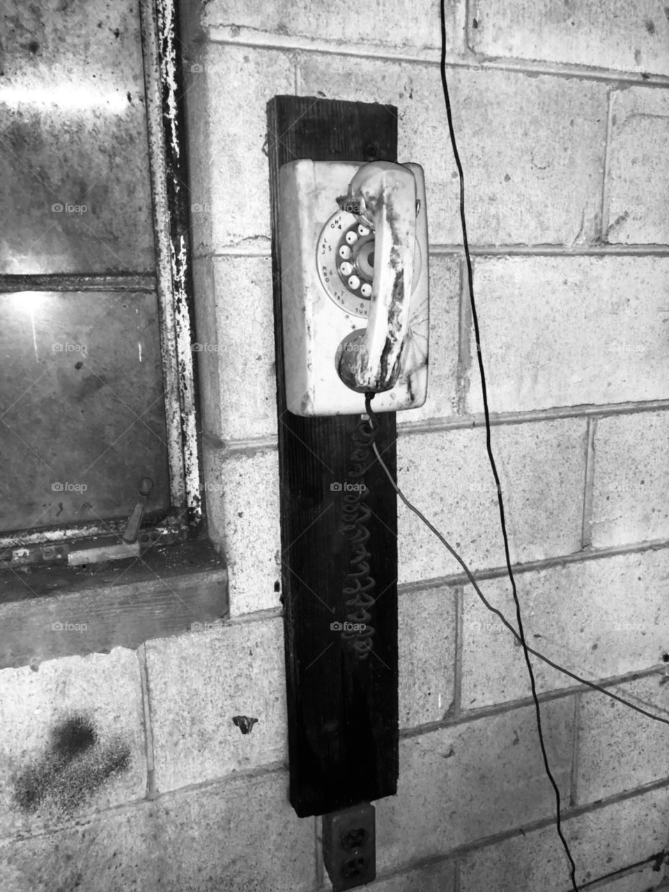 Old Wall Phone in Machine Shop