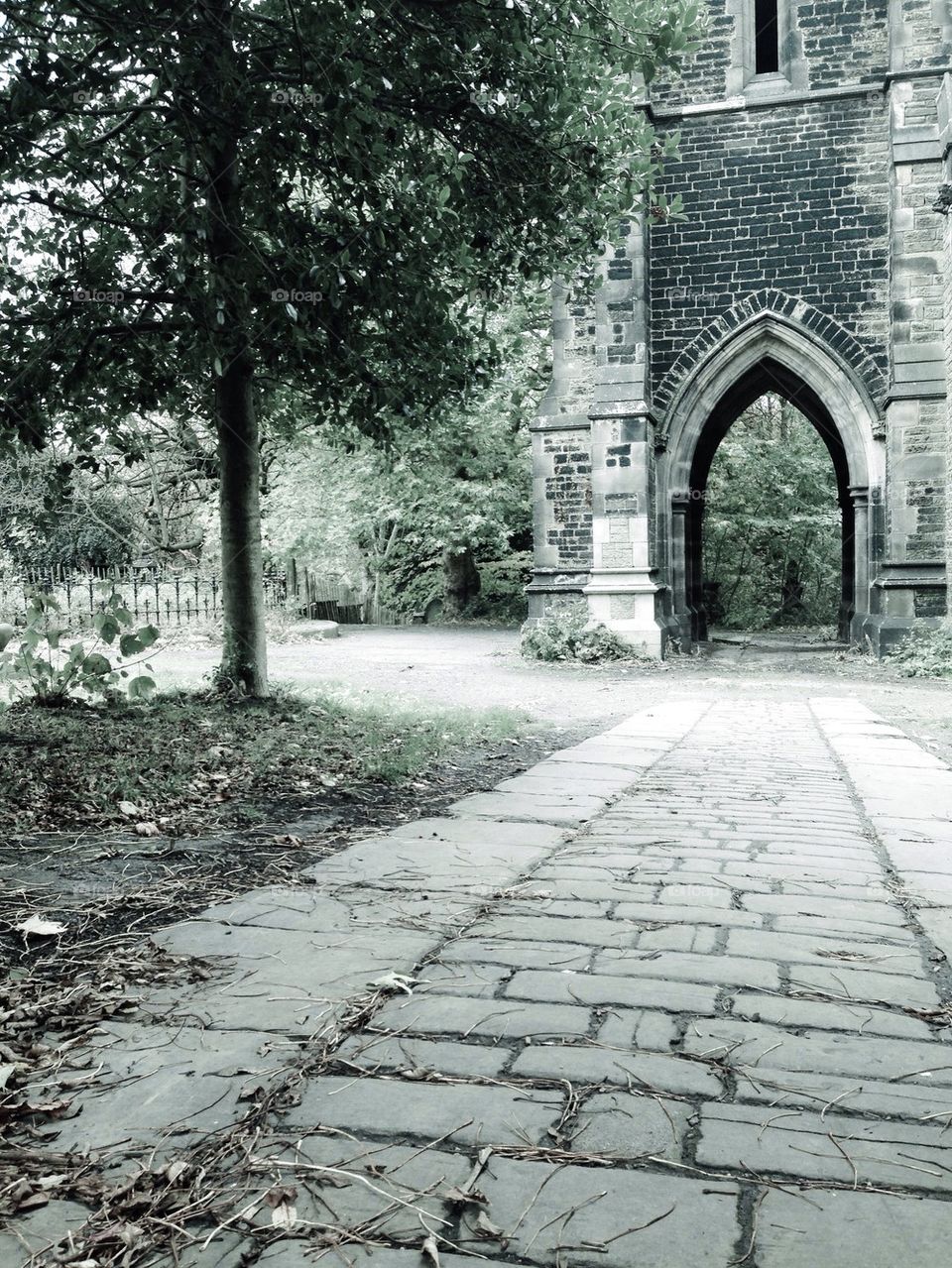 Cobbled path to derelict church