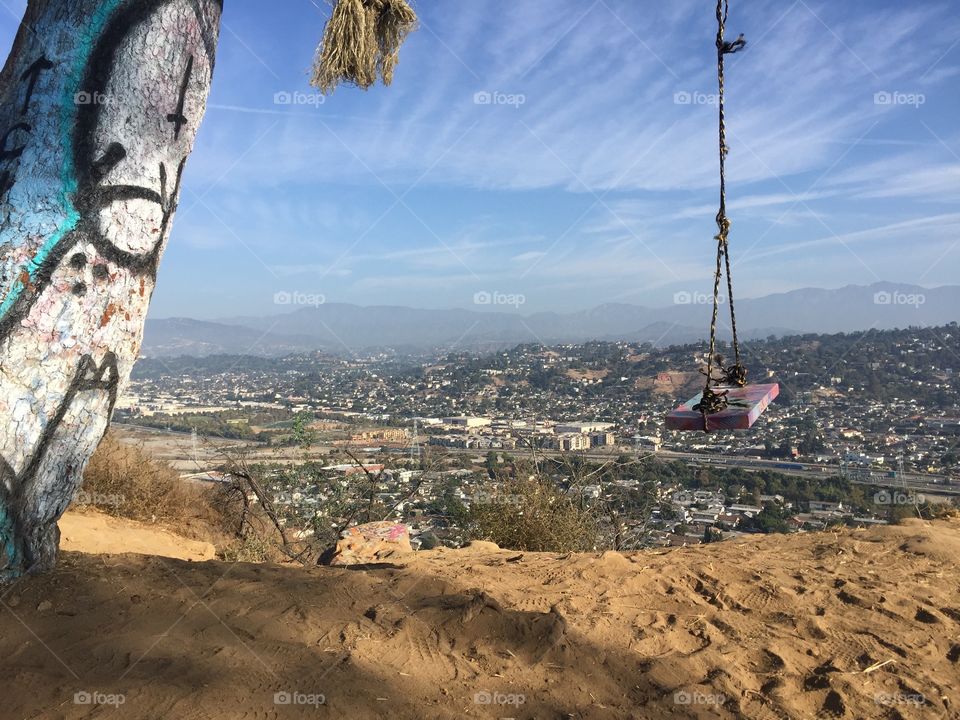 A swing with a fantastic view in Elysian Park in LA.