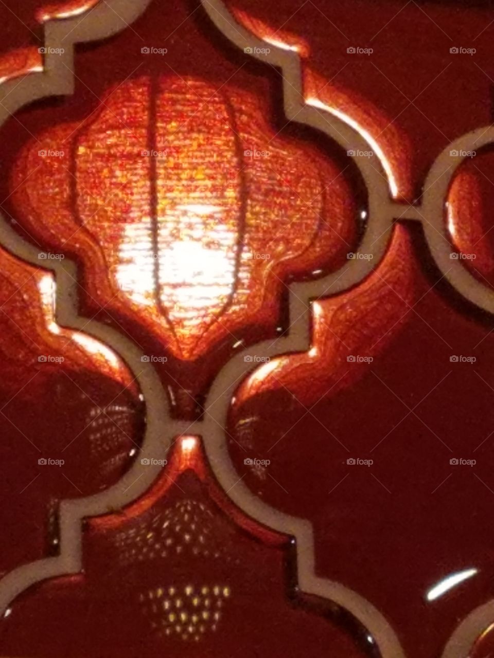 Reflections in red tile