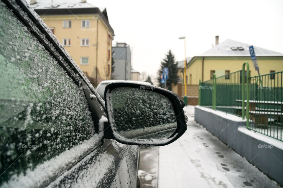 car rear mirror during winter. Slovakia