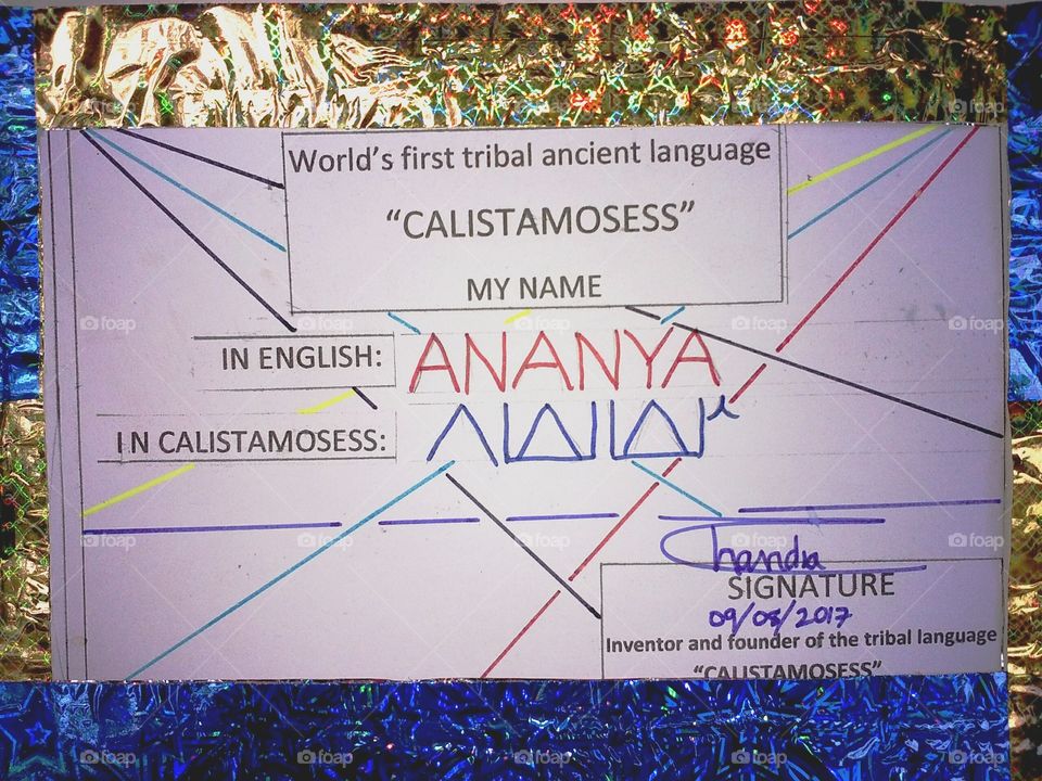 the famous name of INDIA, ANANYA  is written in the world's first ancient tribal language in the CALISTAMOSESS.