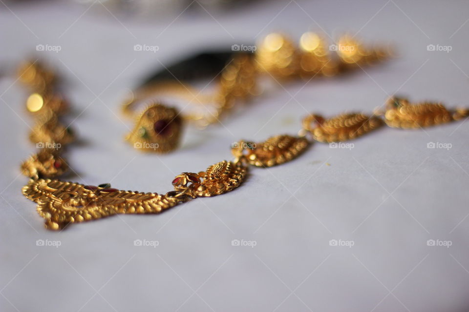 Golden necklace and jewellery