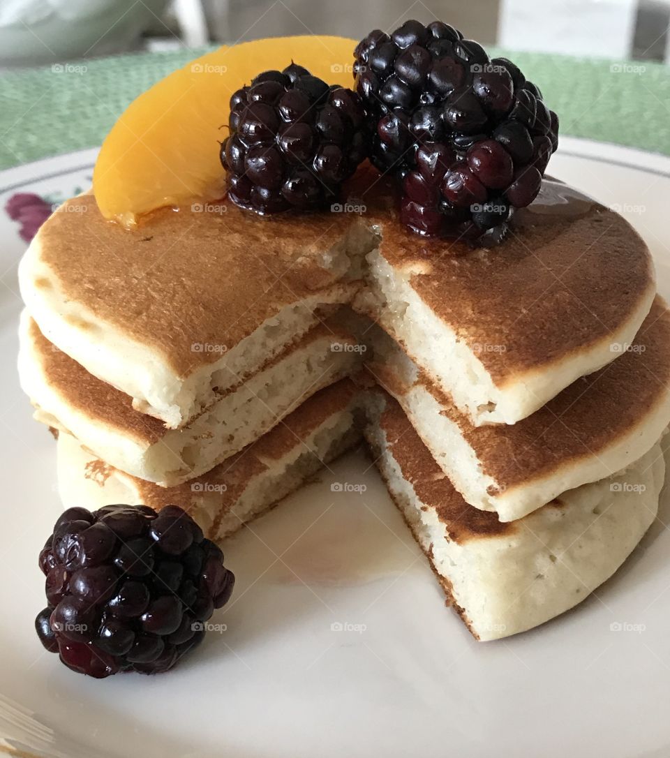 The first bite of the pancake stack 