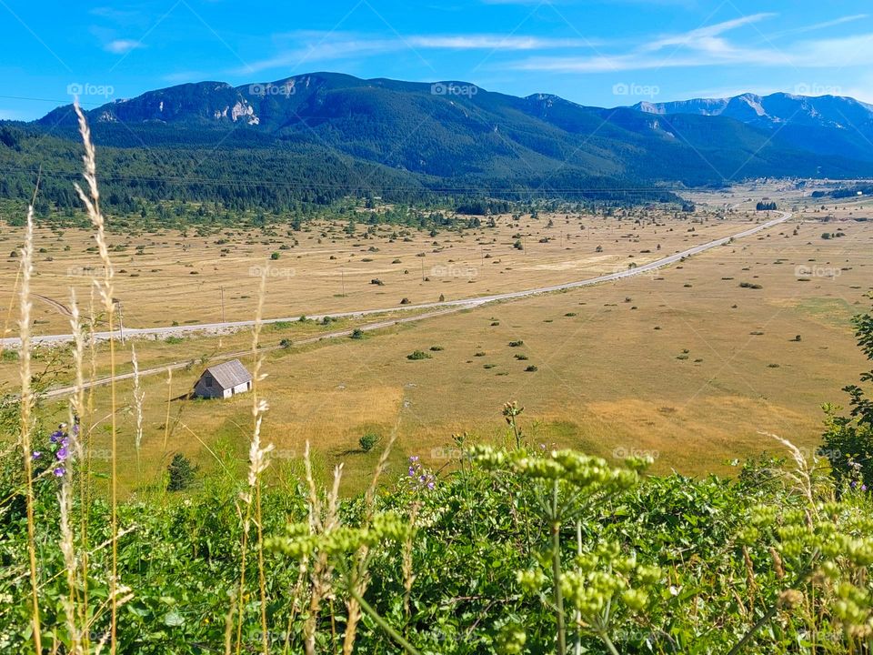 A wonderful view from above of the road trough the valley in summer. Bosnia and Herzegovina