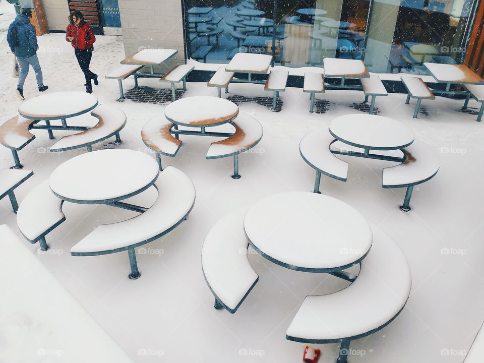 McDonalds tables in the snow in the city of Kiev
