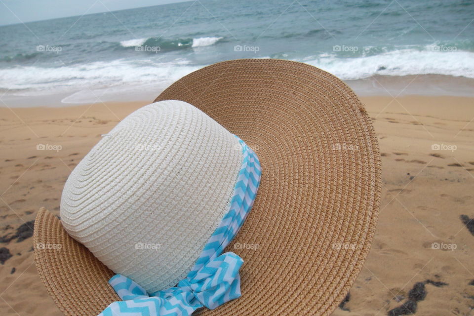 Hat and the beach