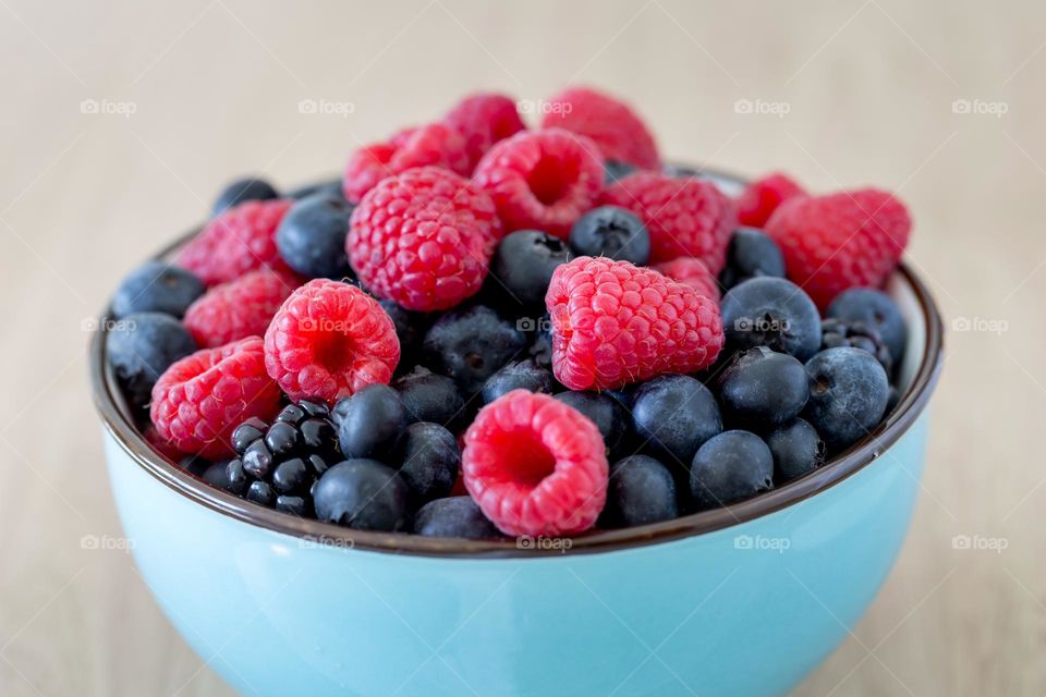 Bowl of fresh berries, closeup