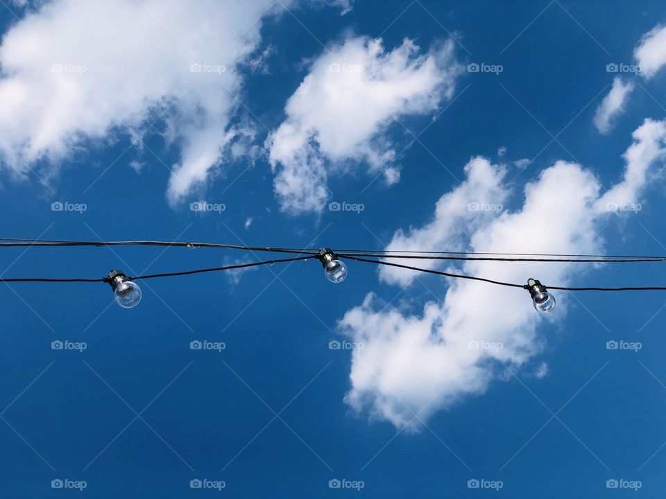 Blue sky with puffy clouds