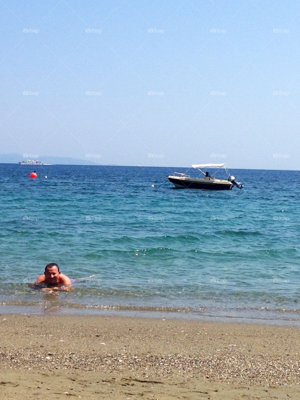 Man swimming in sea