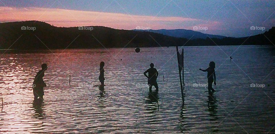 Volleyball in sunset