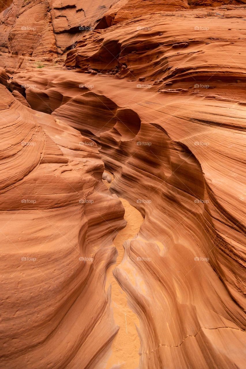 We paddleboarded across Lake Powell to reach antelope canyon. these sandstone slots were pure magic