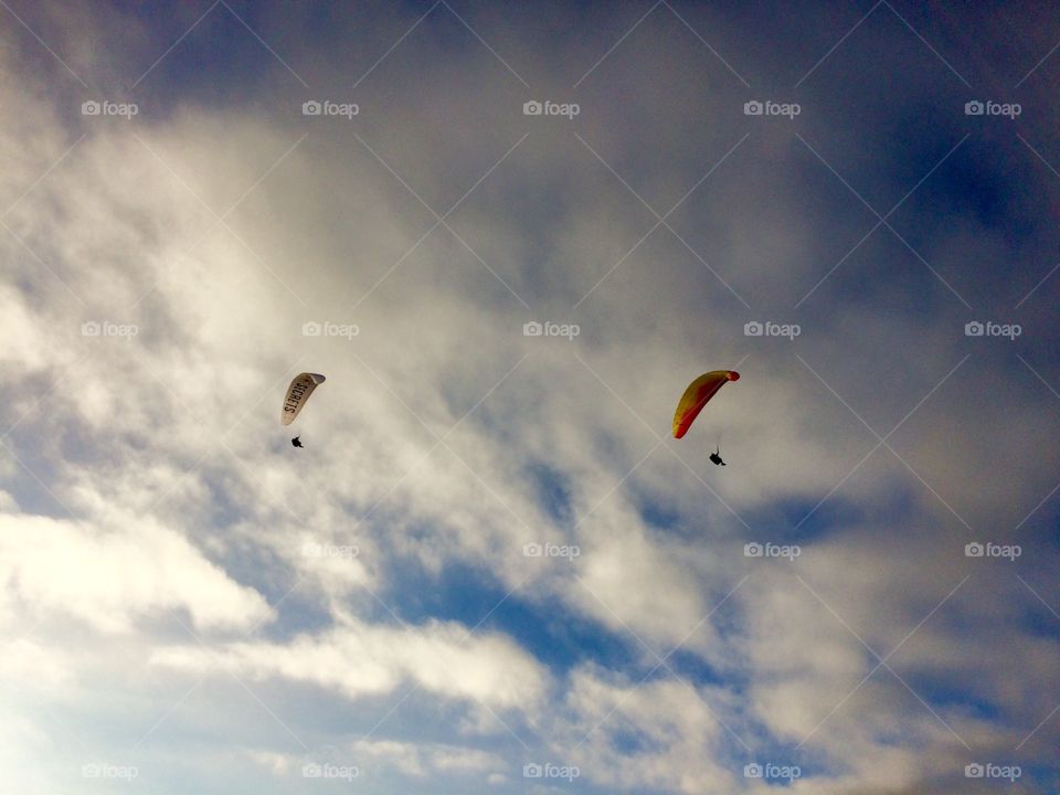 Late evening photo of parasailing over Blacks Beach, La Jolla, CA